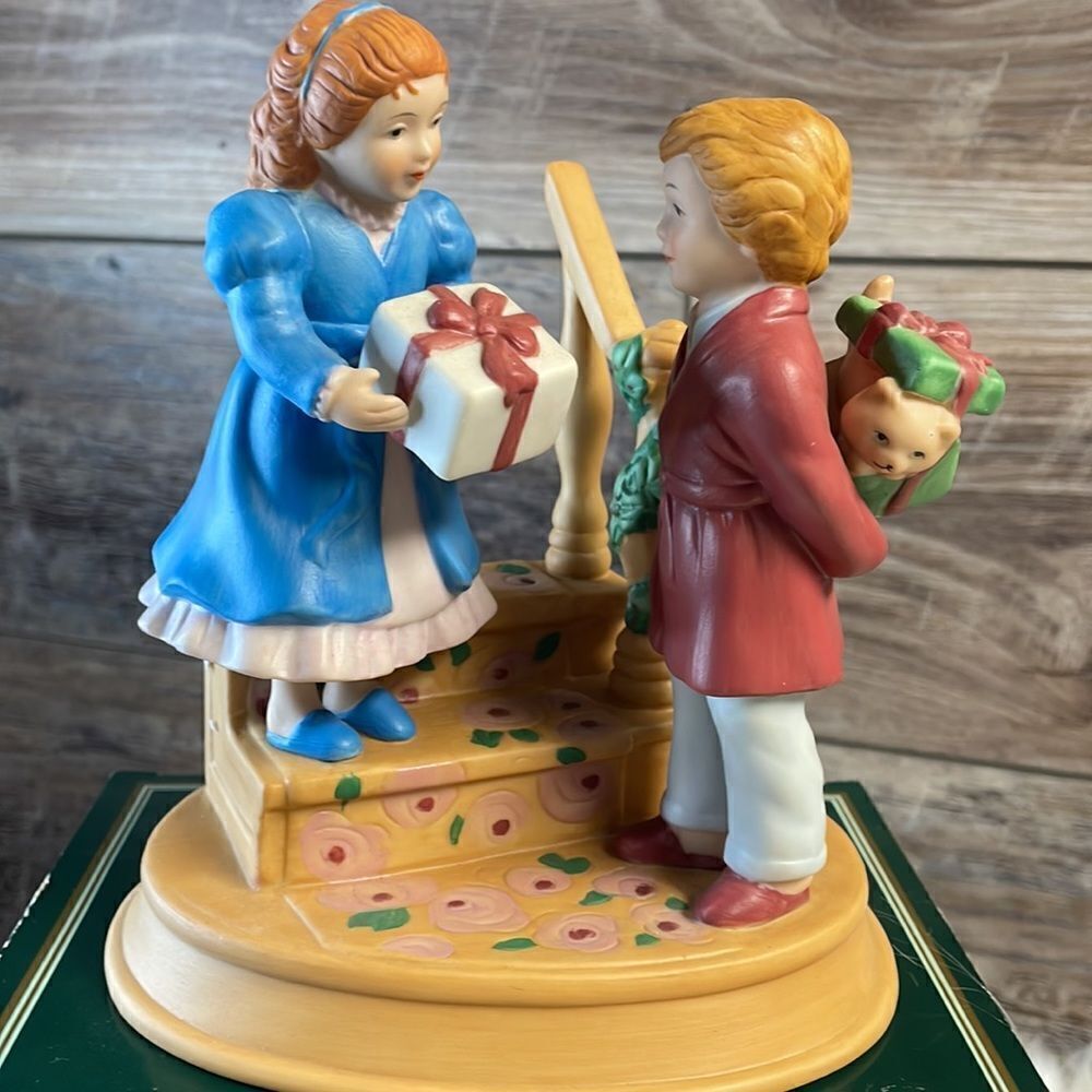 Avon Vintage 1984 Christmas Memories Figurine, Celebrating the Joy of Giving